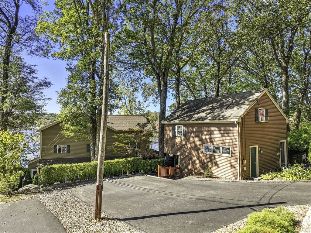 28 Downey Street Hopkinton, MA 01748 - Photo 31 of 39 a view of a house with a tree in front