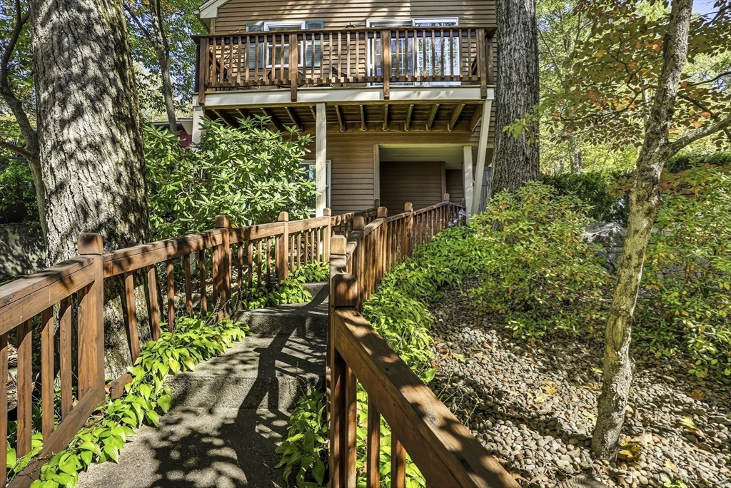 28 Downey Street Hopkinton, MA 01748 - Photo 32 of 39 a front view of a house with a yard