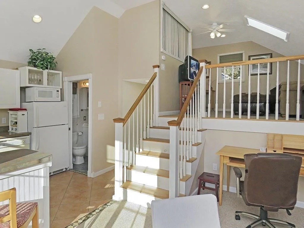 28 Downey Street Hopkinton, MA 01748 - Photo 34 of 39 a living room with furniture and a rug