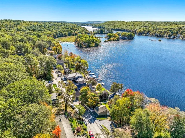a view of balcony with wooden floor and a ocean view