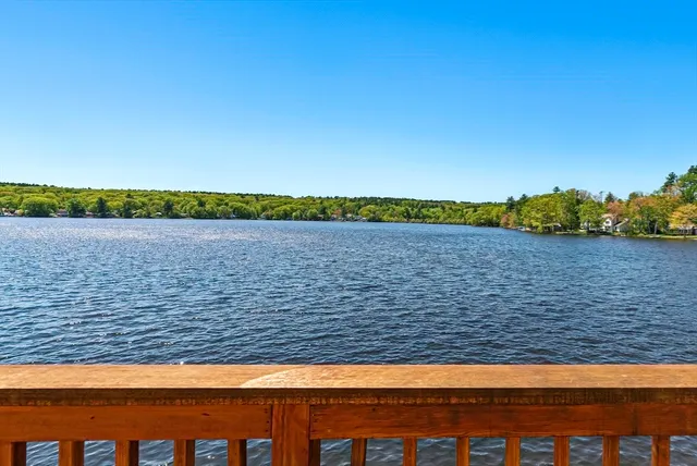 a view of roof deck with patio