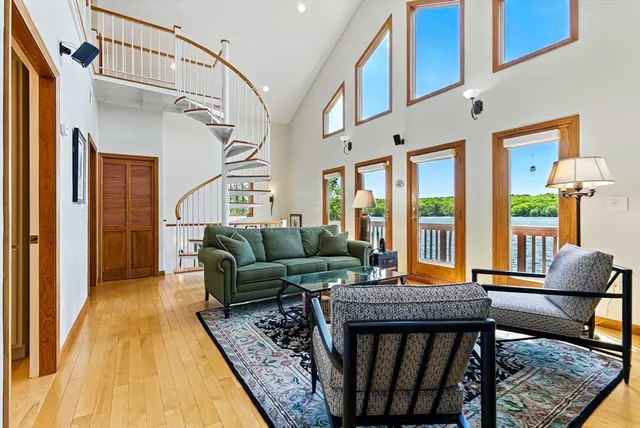 a kitchen with a sink appliances and cabinets