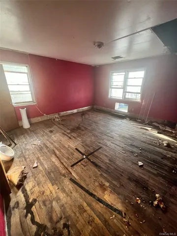 a view of an empty room and window