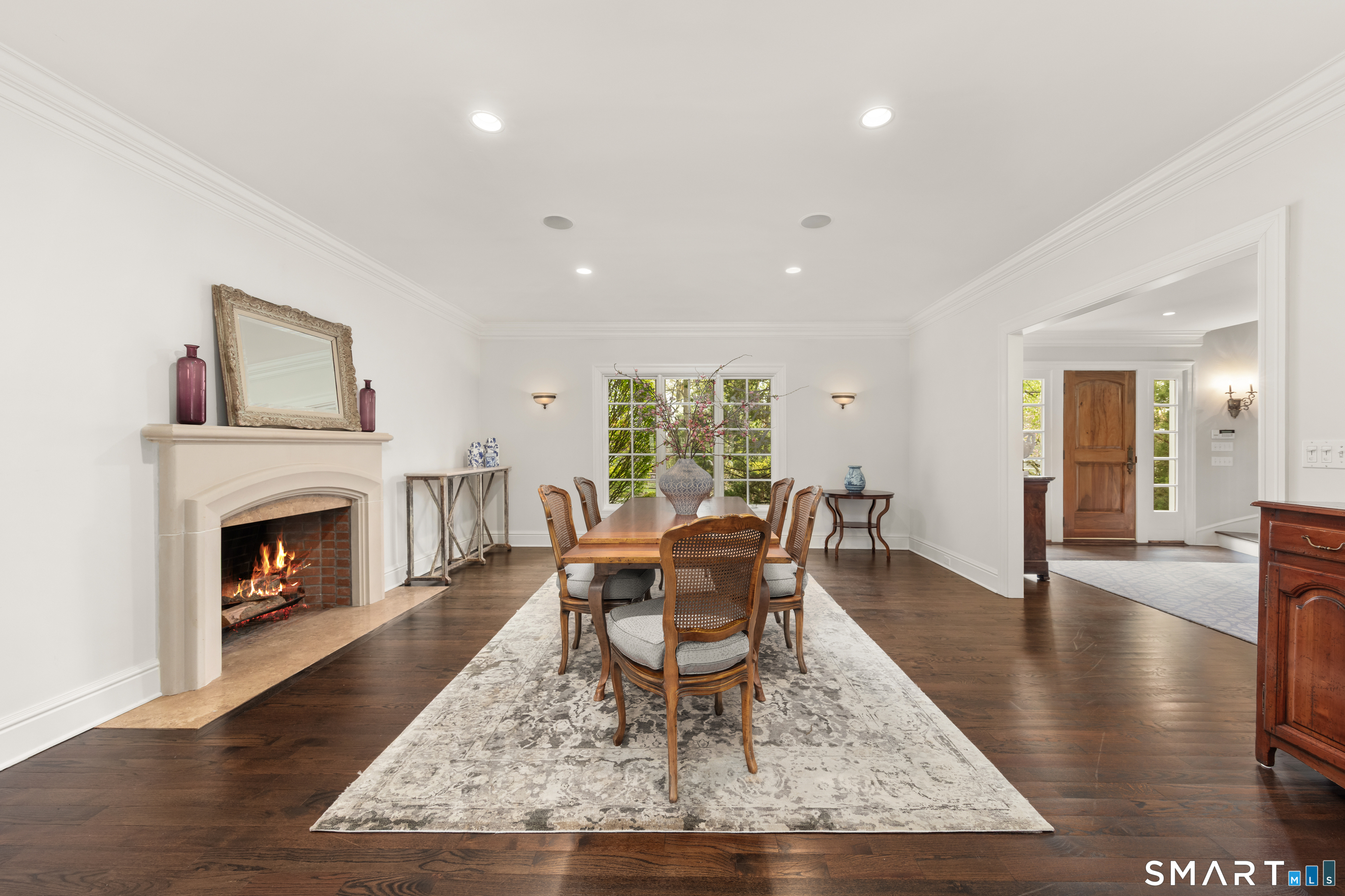 22 Cavray Road Norwalk, CT 06855 - Photo 19 of 40 a living room with furniture a fireplace and wooden floor