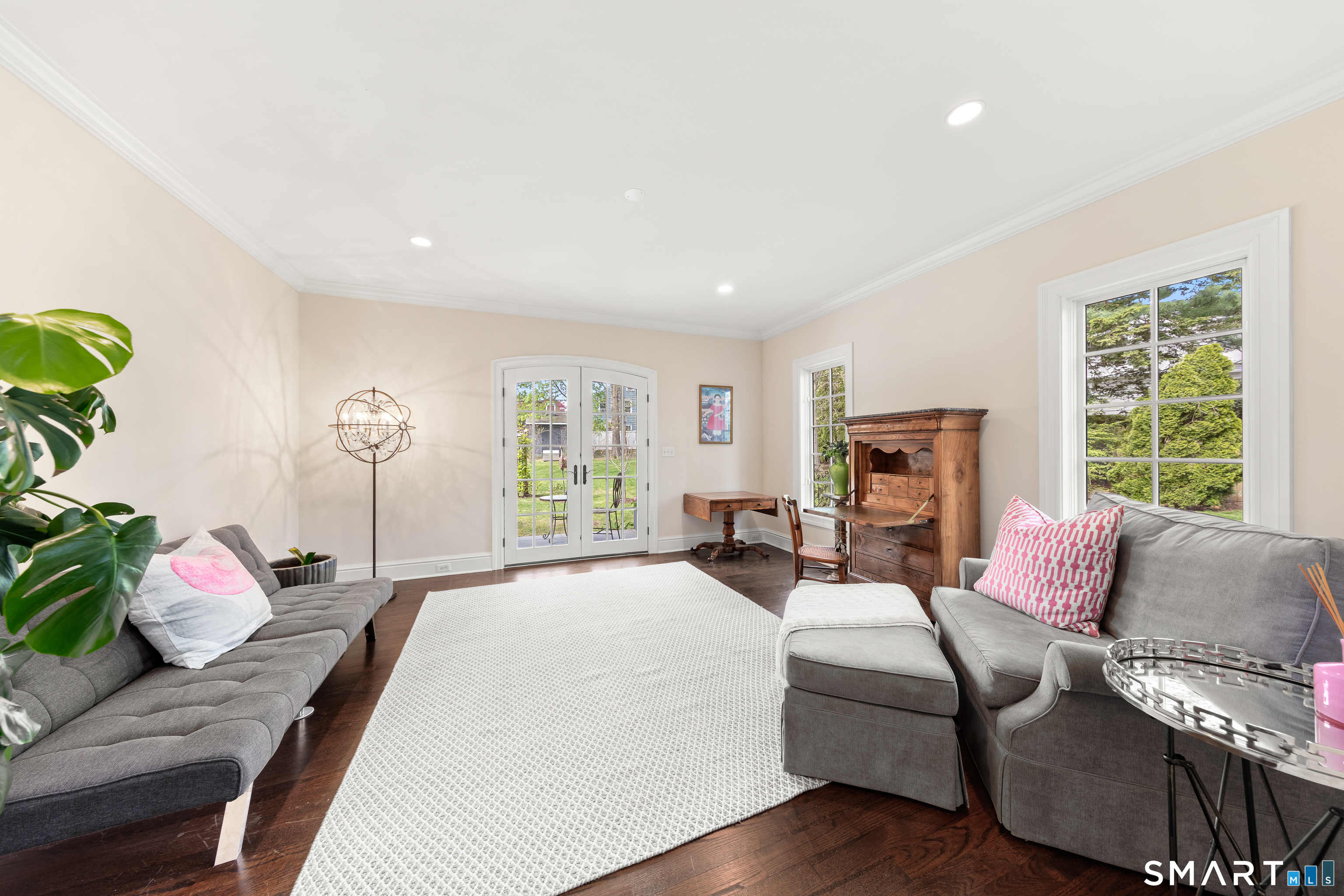 22 Cavray Road Norwalk, CT 06855 - Photo 22 of 40 Lower Level sitting room with French Doors leading to the back patio and yard