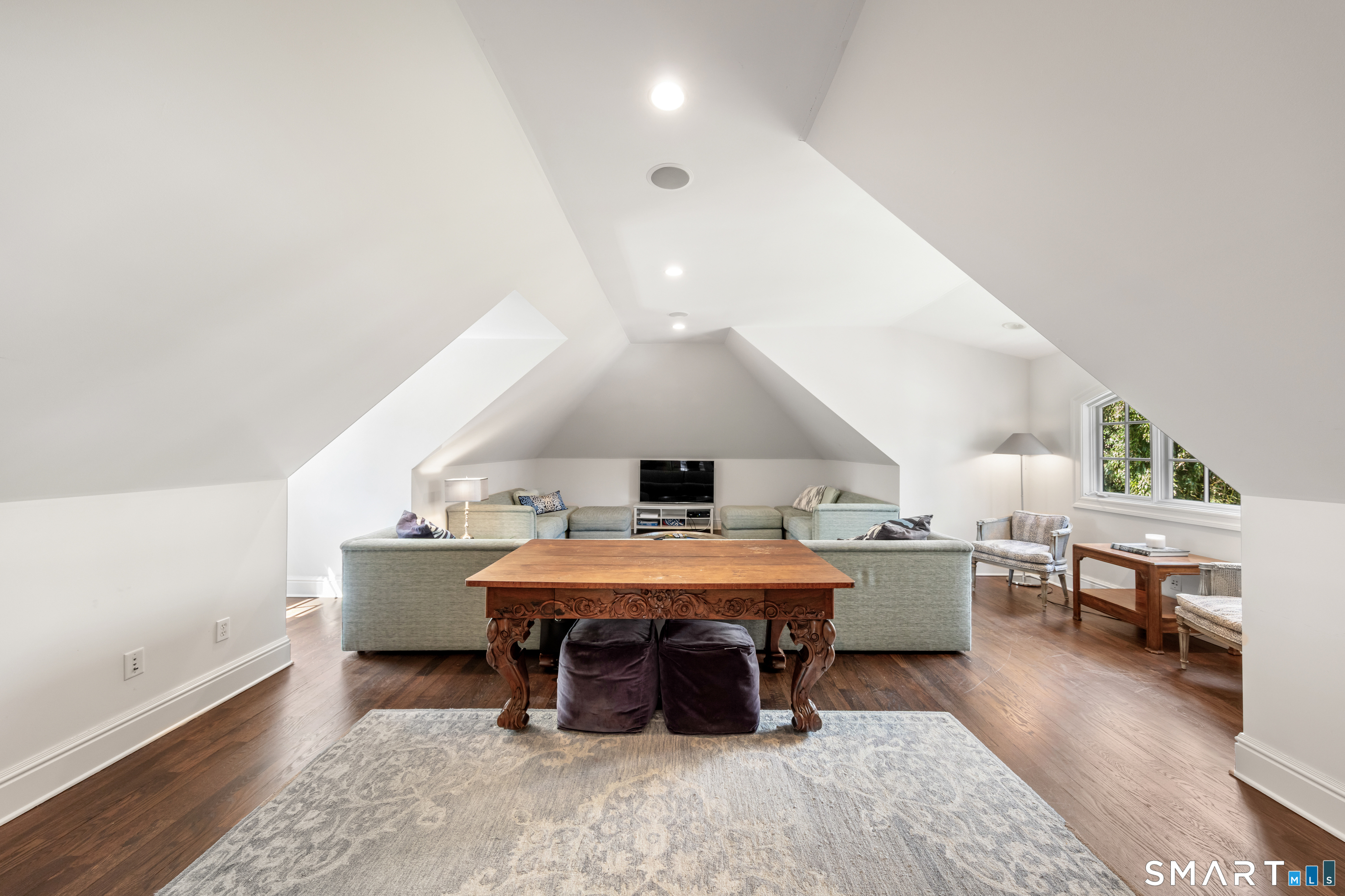 22 Cavray Road Norwalk, CT 06855 - Photo 32 of 40 Media Room with vaulted ceiling above the 3 car garage