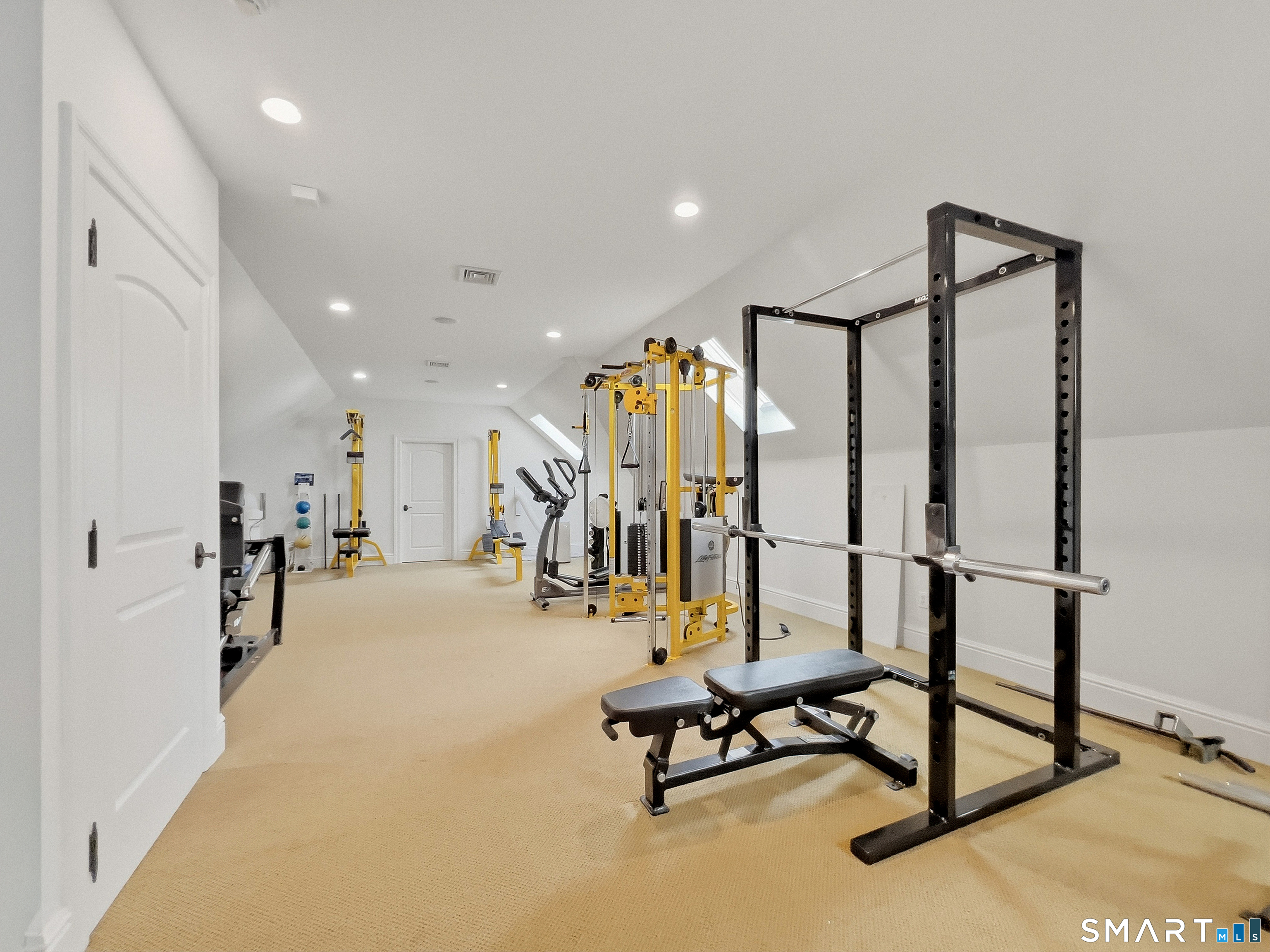 22 Cavray Road Norwalk, CT 06855 - Photo 35 of 40 Third Floor Playroom or Exercise Room with half bath