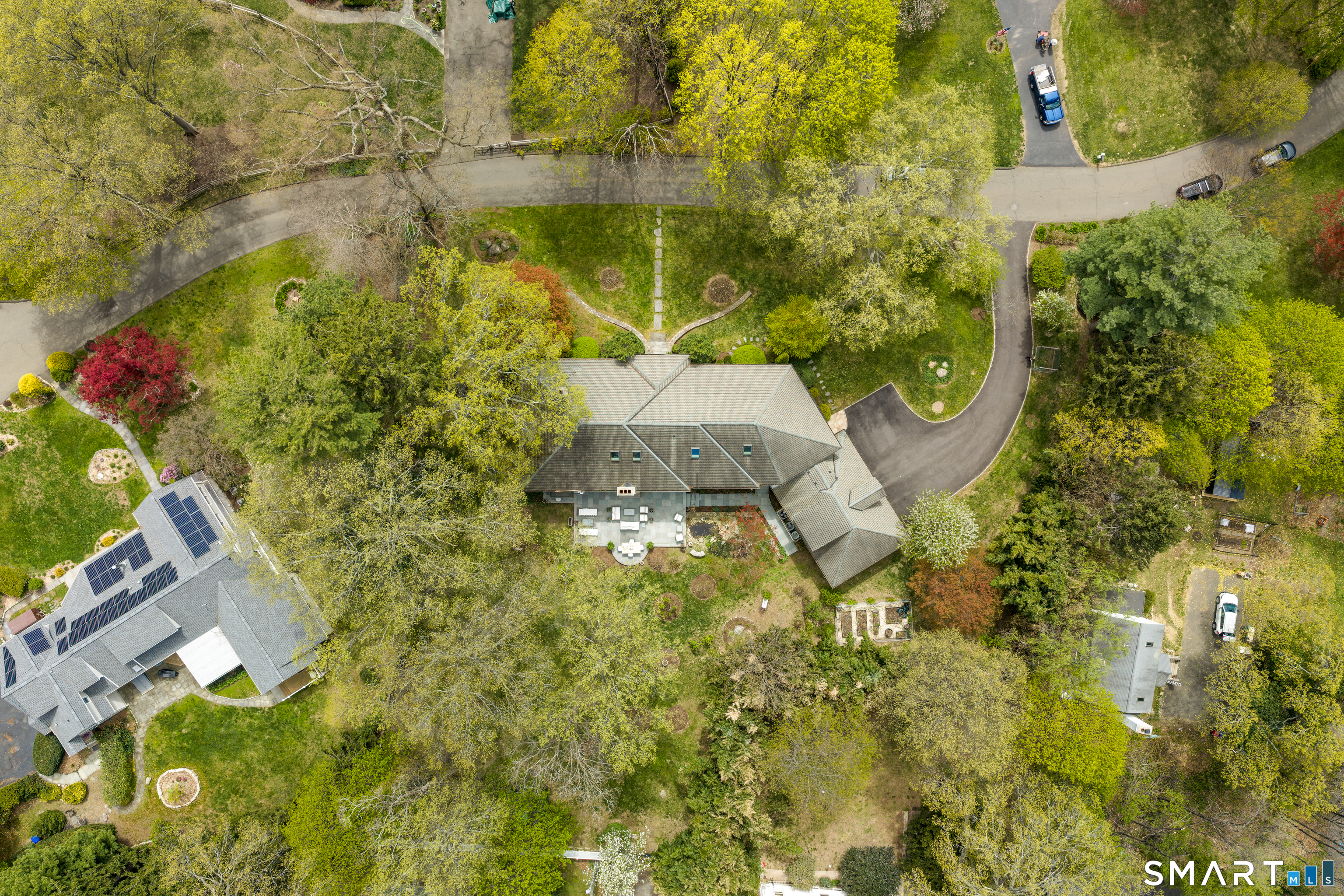 22 Cavray Road Norwalk, CT 06855 - Photo 36 of 40 Aerial View of 22 Cavray Road with a flat backyard, mature plantings, bluestone patio and charming Koi pond