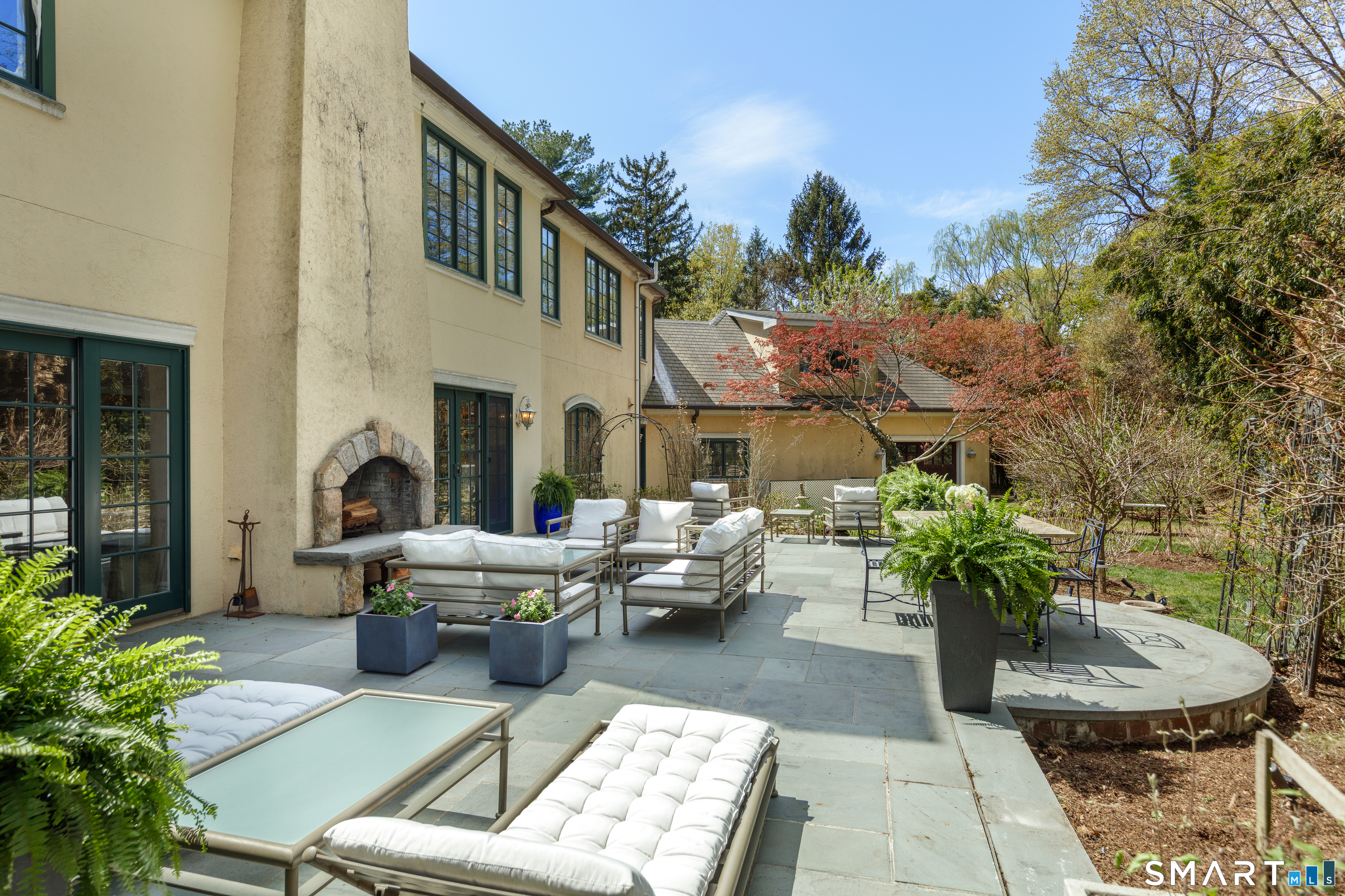22 Cavray Road Norwalk, CT 06855 - Photo 39 of 40 Large Bluestone Back Patio with access to Living Room and Lower Level Den
