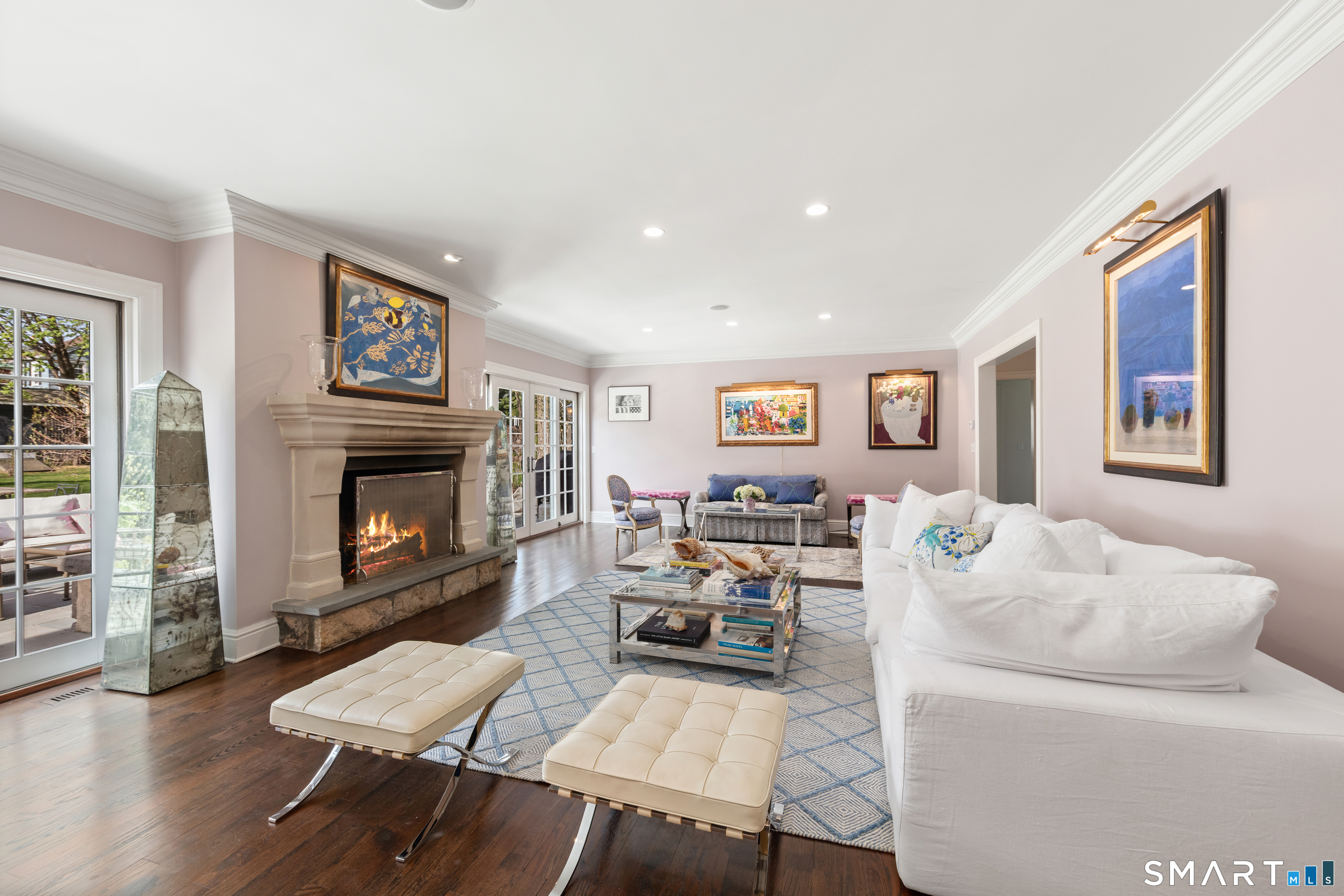 22 Cavray Road Norwalk, CT 06855 - Photo 6 of 40 a living room with furniture and a fireplace