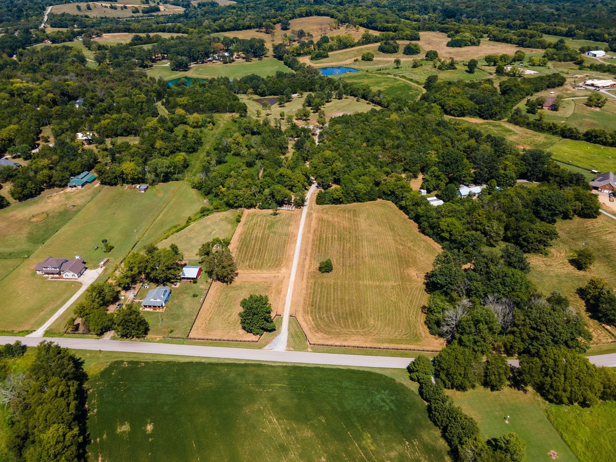 8362 Patterson Road College Grove, TN 37046 - Photo 2 of 27 an aerial view of residential house with outdoor space and swimming pool