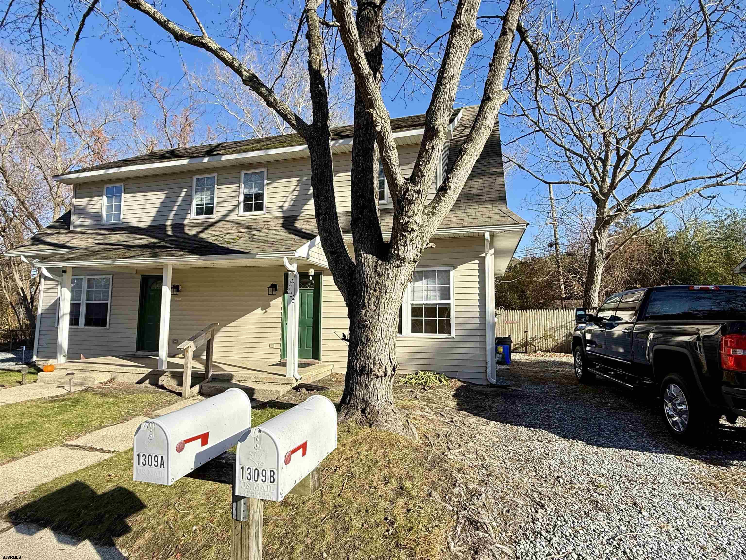 1309 Matthews Avenue, Unit B Mays Landing, NJ 08330 - Photo 2 of 19 a view of a street with cars