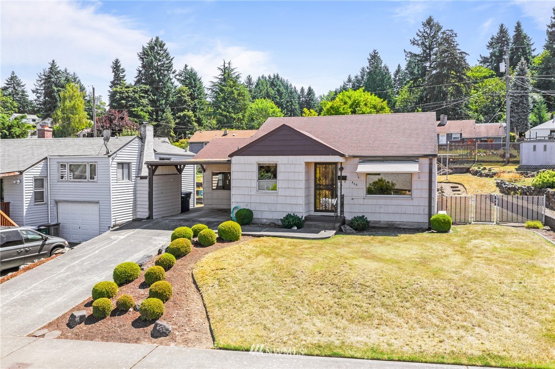 464 Bronson Way Northeast Renton, WA 98056 - Photo 1 of 25 a view of a house with swimming pool