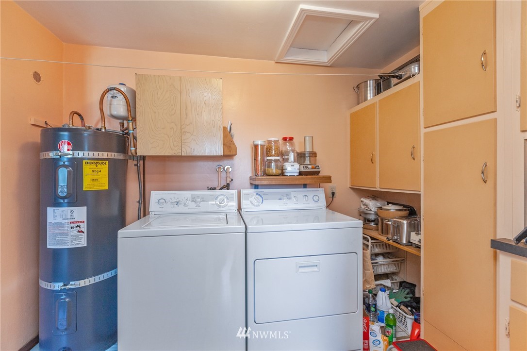 464 Bronson Way Northeast Renton, WA 98056 - Photo 17 of 25 a utility room with dryer and washer