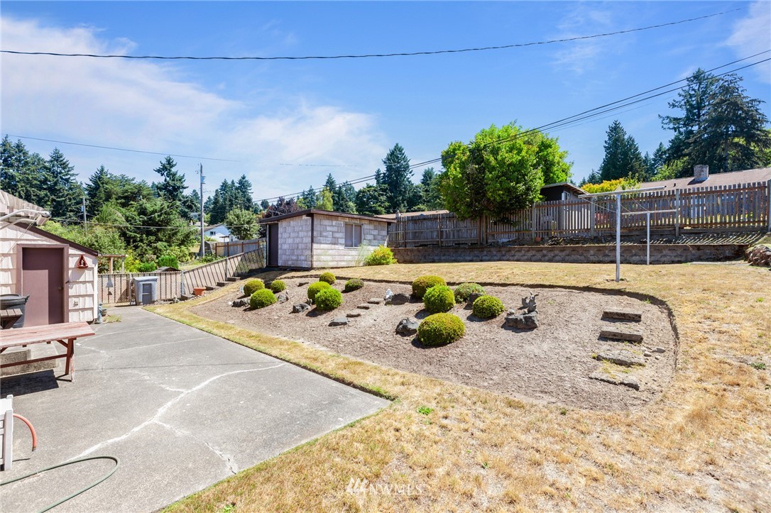 464 Bronson Way Northeast Renton, WA 98056 - Photo 18 of 25 a view of a swimming pool with a patio