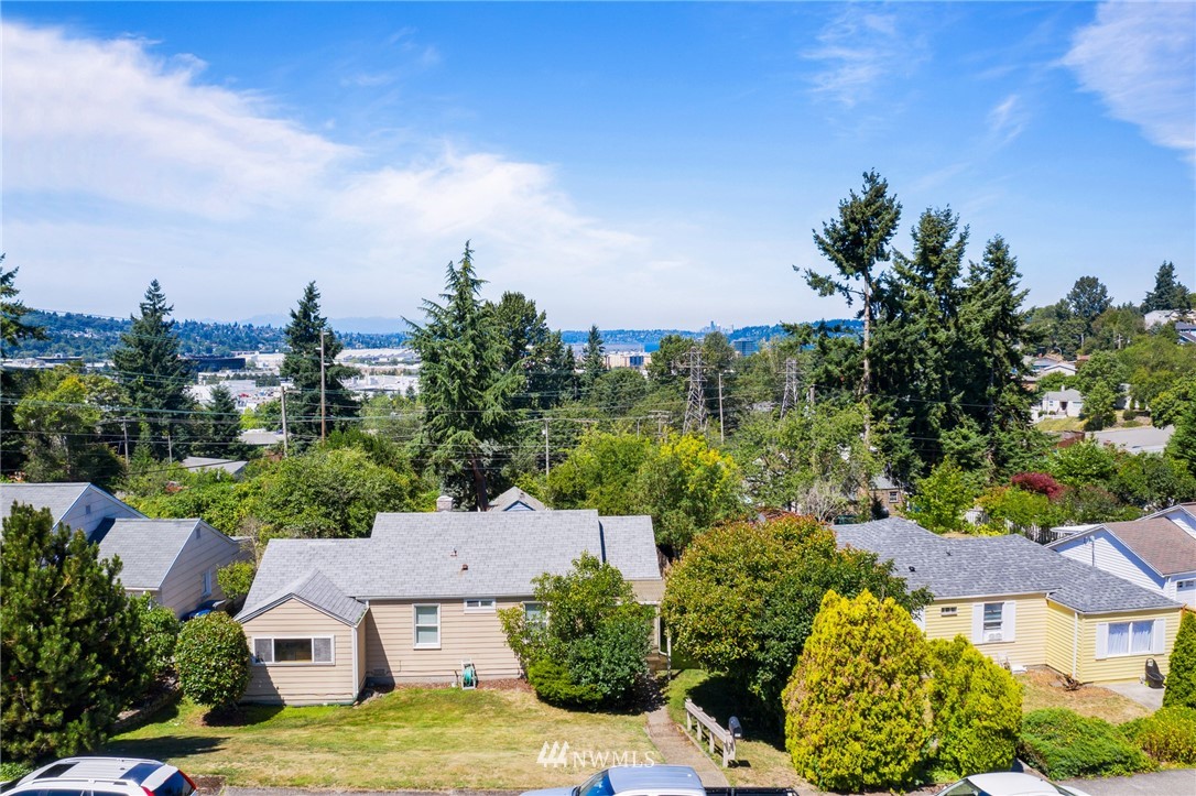 464 Bronson Way Northeast Renton, WA 98056 - Photo 24 of 25 an aerial view of residential houses with outdoor space and trees