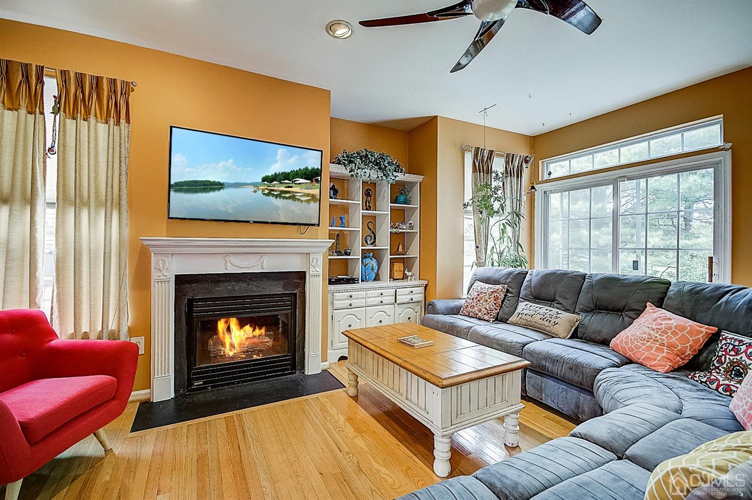 51 Timber Ridge Road North Brunswick, NJ 08902 - Photo 12 of 57 a living room with furniture and a fireplace