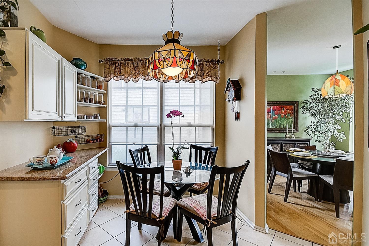 51 Timber Ridge Road North Brunswick, NJ 08902 - Photo 18 of 57 a view of a dining room with furniture window and wooden floor