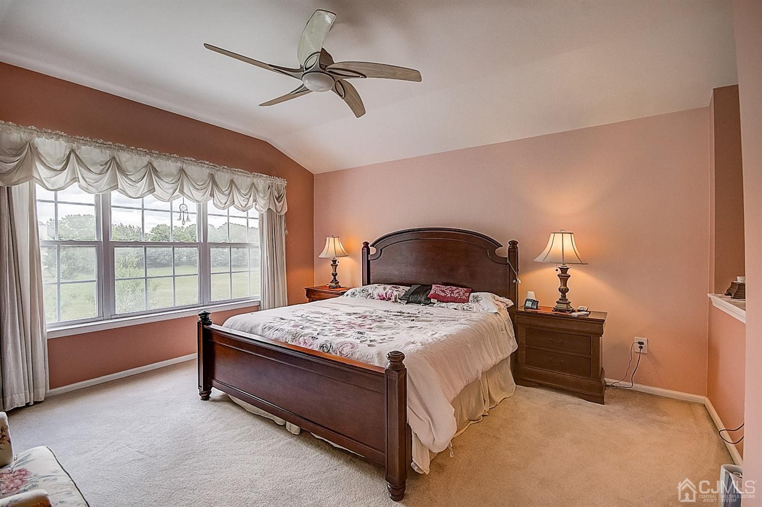 51 Timber Ridge Road North Brunswick, NJ 08902 - Photo 27 of 57 a bedroom with a bed and window