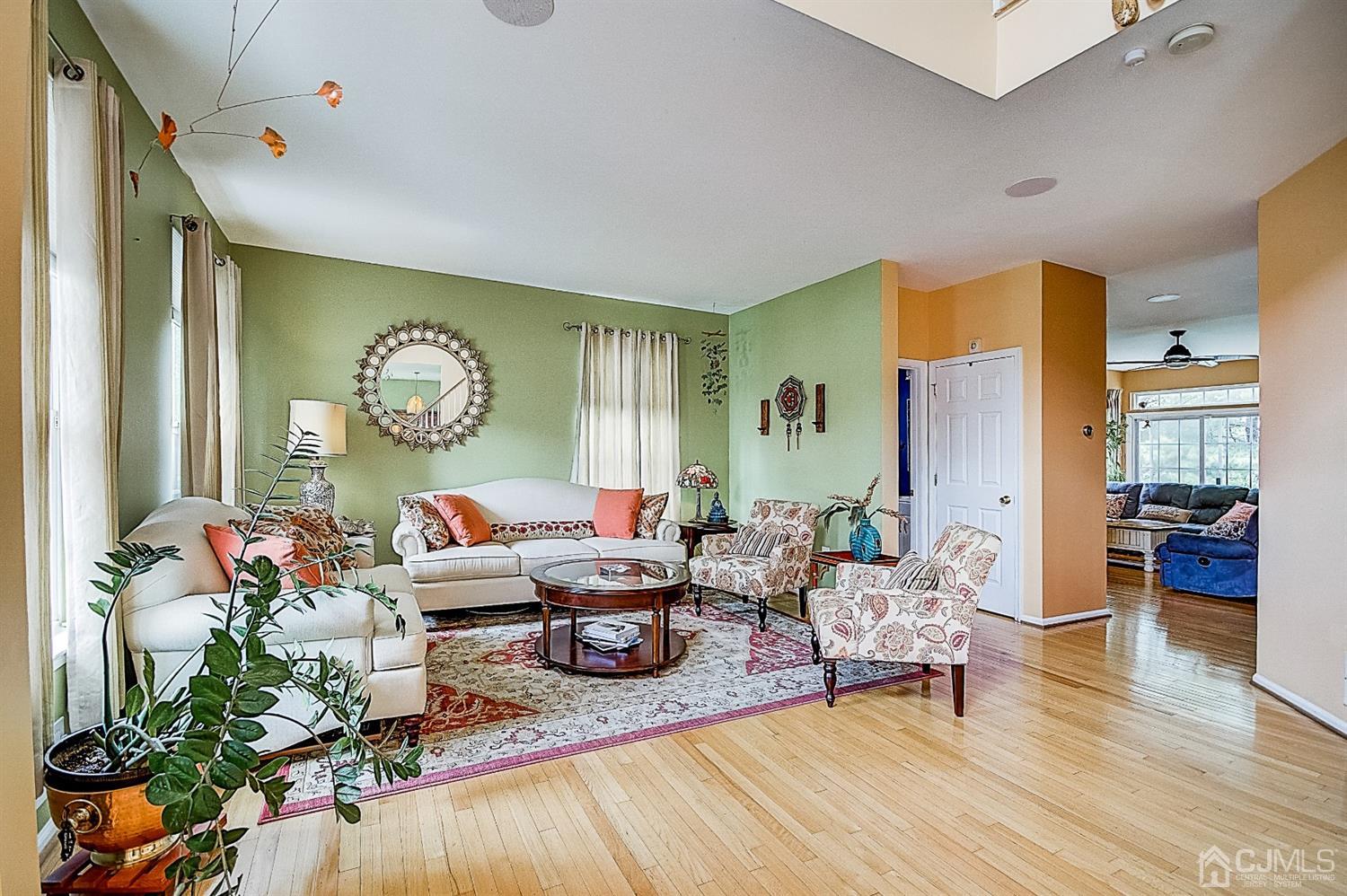 51 Timber Ridge Road North Brunswick, NJ 08902 - Photo 4 of 57 a living room with furniture and wooden floor