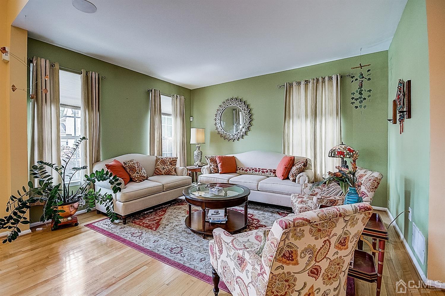 51 Timber Ridge Road North Brunswick, NJ 08902 - Photo 5 of 57 a living room with furniture and a large window