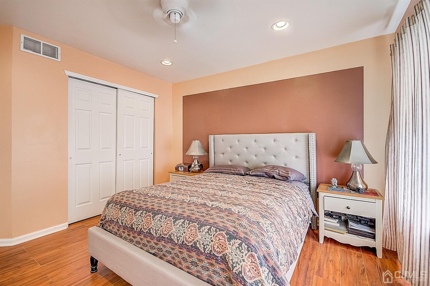 51 Timber Ridge Road North Brunswick, NJ 08902 - Photo 41 of 57 a bedroom with a bed and a table