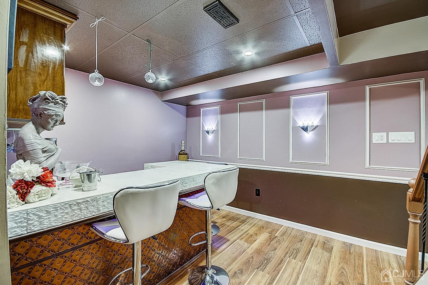 51 Timber Ridge Road North Brunswick, NJ 08902 - Photo 45 of 57 a room with furniture and wooden floor