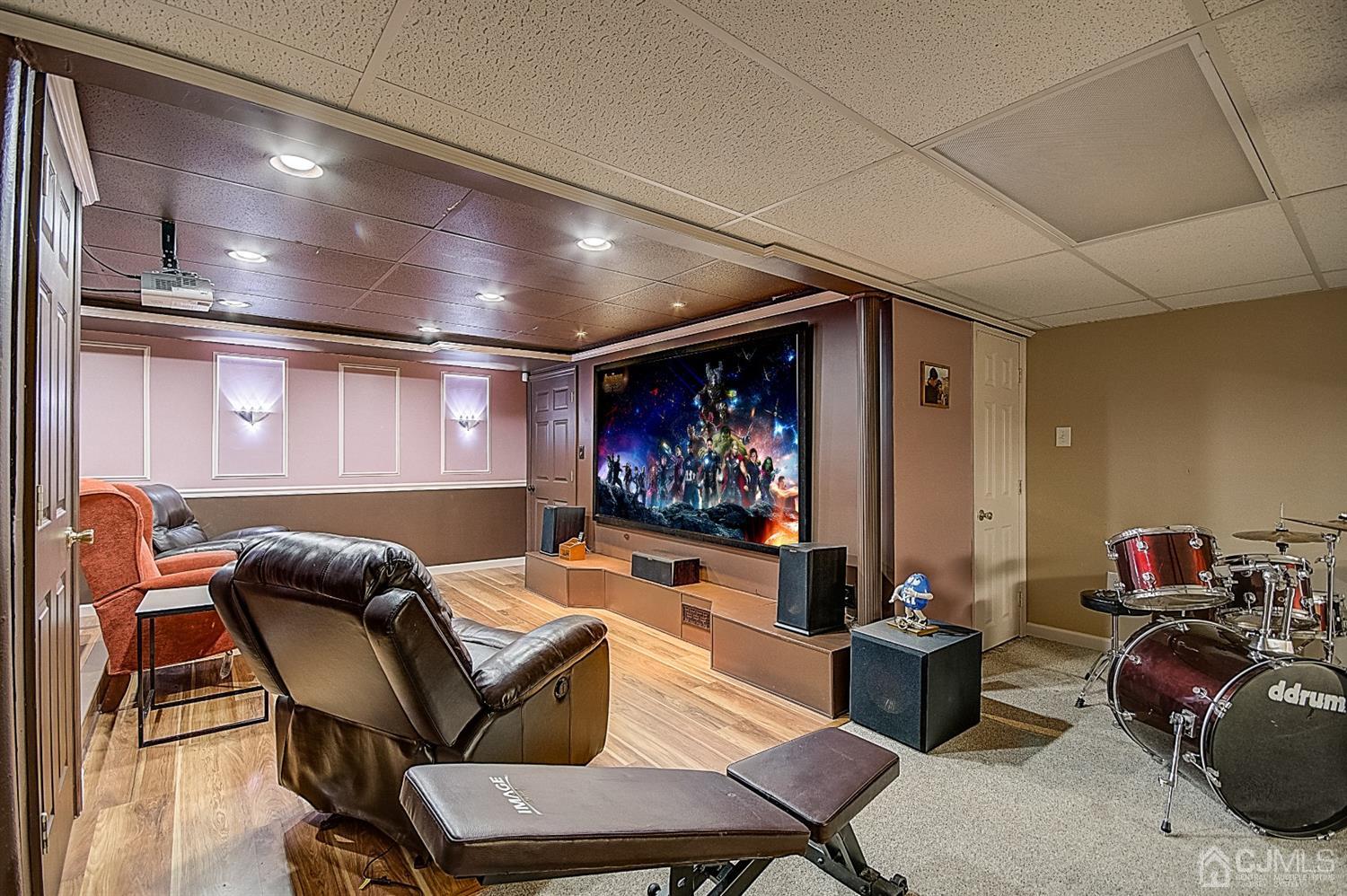 51 Timber Ridge Road North Brunswick, NJ 08902 - Photo 47 of 57 a living room with furniture and a flat screen tv