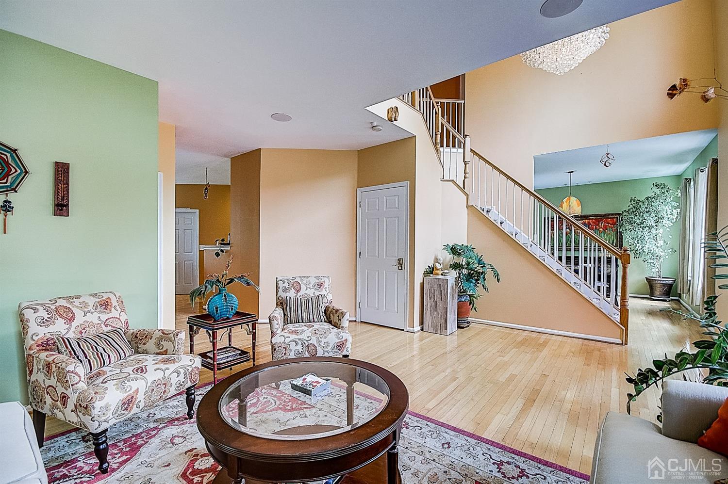 51 Timber Ridge Road North Brunswick, NJ 08902 - Photo 6 of 57 a living room with furniture and a table