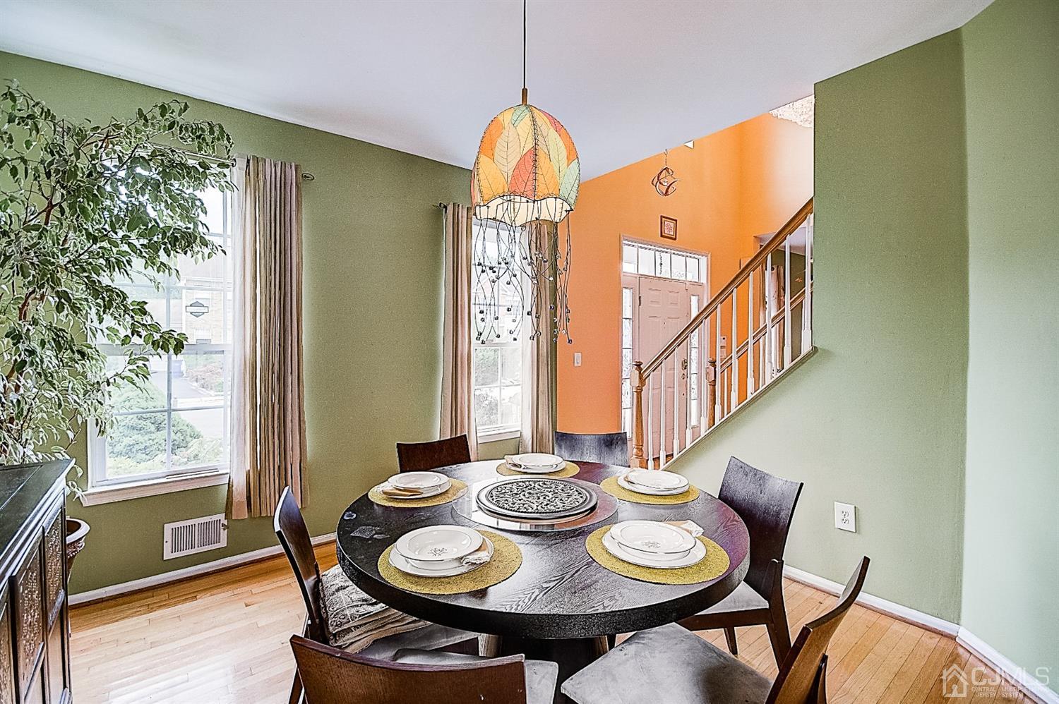 51 Timber Ridge Road North Brunswick, NJ 08902 - Photo 7 of 57 a view of a dining room with furniture window and wooden floor