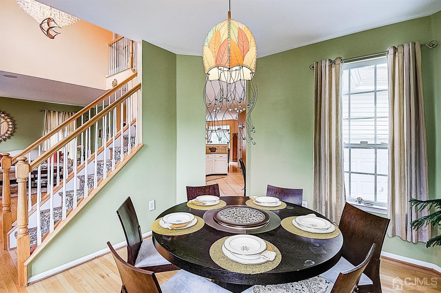 51 Timber Ridge Road North Brunswick, NJ 08902 - Photo 8 of 57 a view of a dining room with furniture window and wooden floor