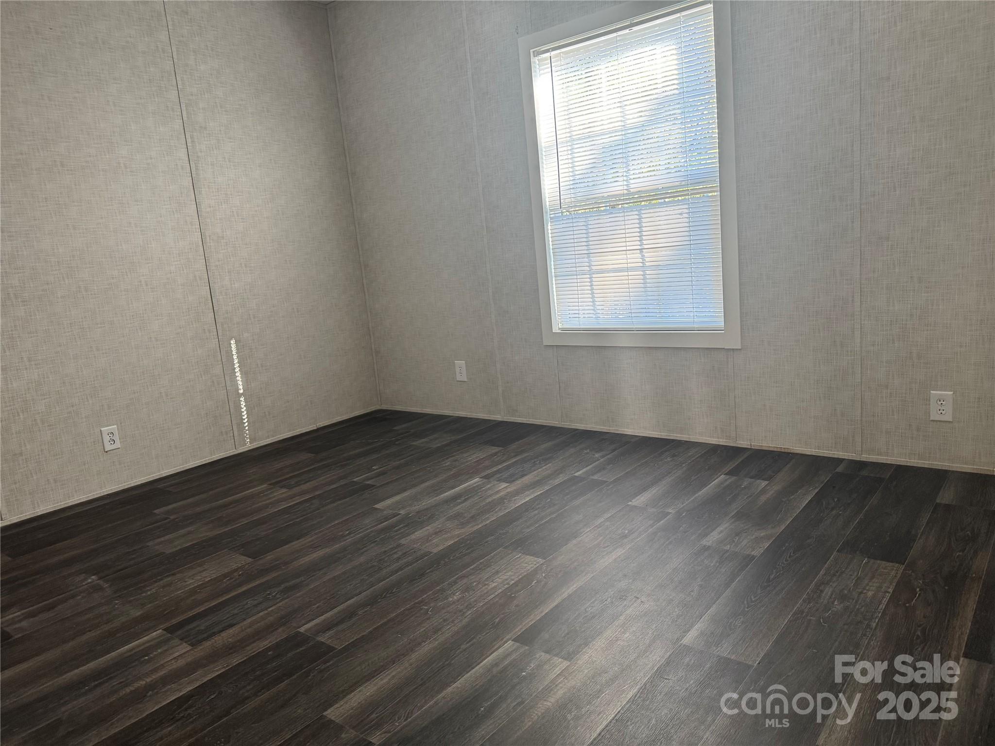 3960 State Rd S-28-414 Kershaw, SC 29067 - Photo 17 of 20 an empty room with wooden floor and windows