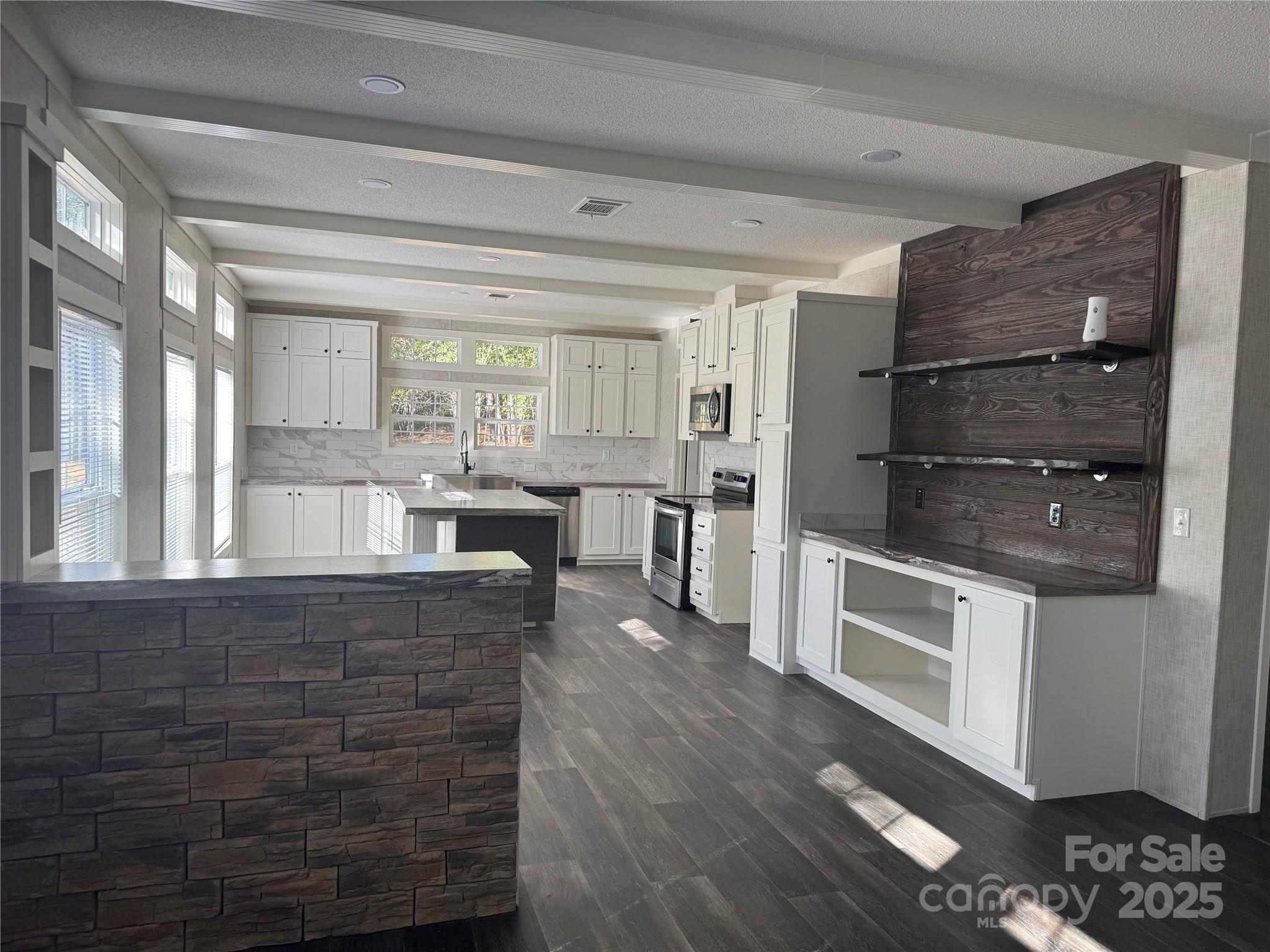 3960 State Rd S-28-414 Kershaw, SC 29067 - Photo 8 of 20 a living room with stainless steel appliances kitchen island granite countertop wooden floor and view living room