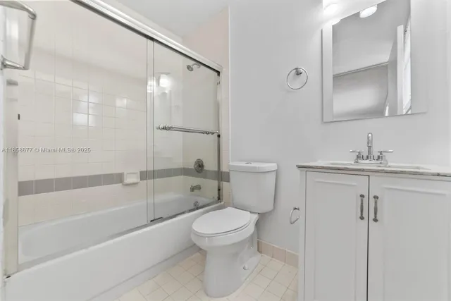a bathroom with a toilet sink and a bathtub
