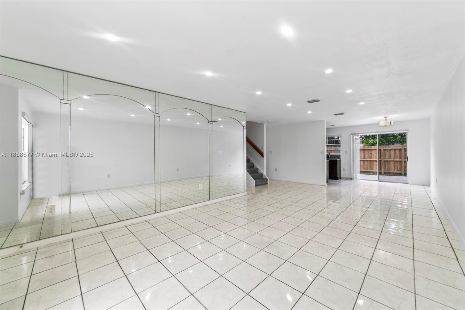 3358 Northwest 198th Terrace Miami Gardens, FL 33056 - Photo 4 of 26 a view of an empty room