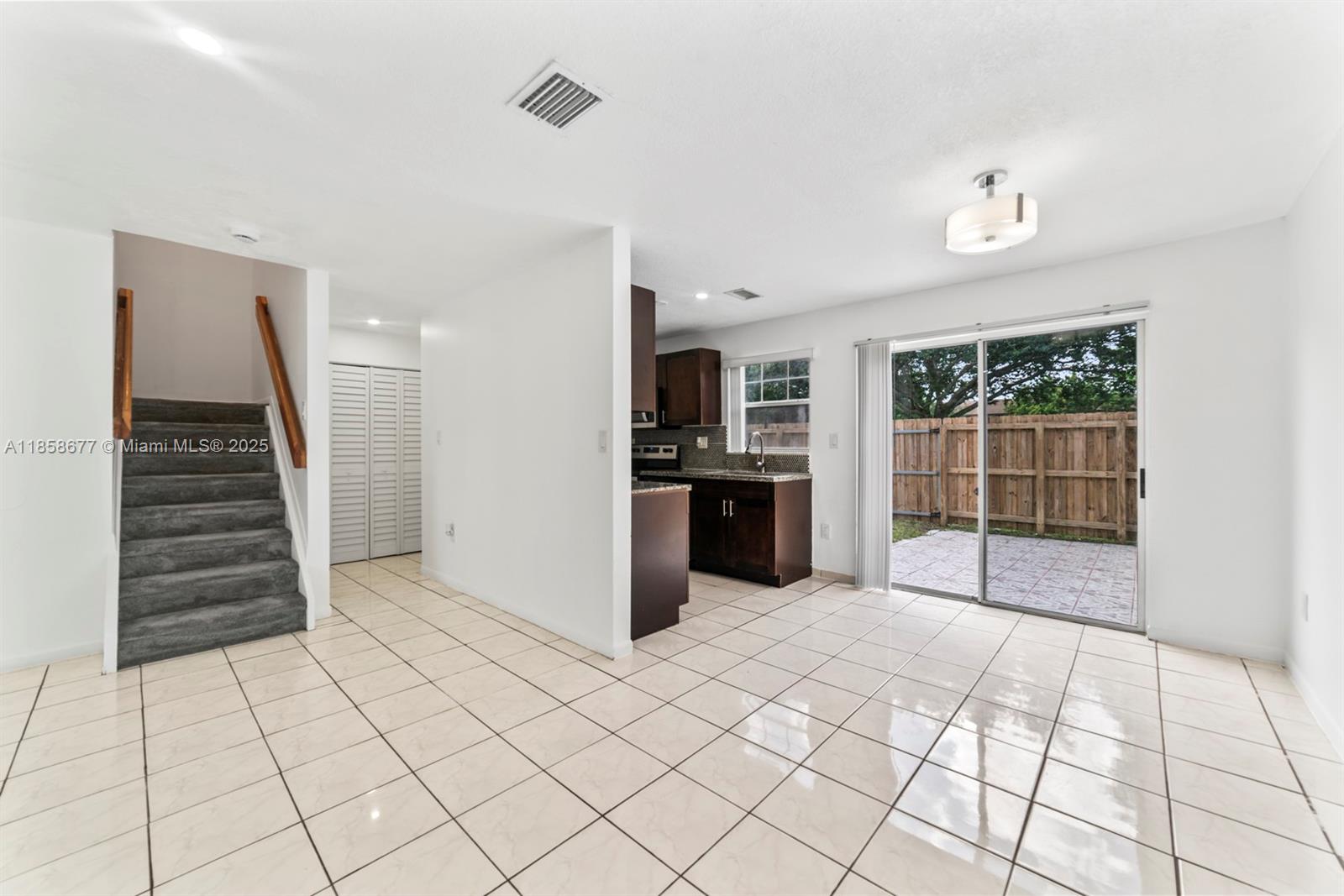 3358 Northwest 198th Terrace Miami Gardens, FL 33056 - Photo 5 of 26 a view of an empty room with a window
