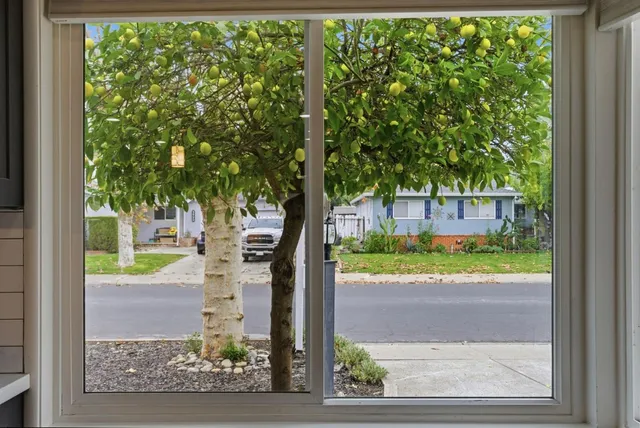 a bed room with a bed and a window