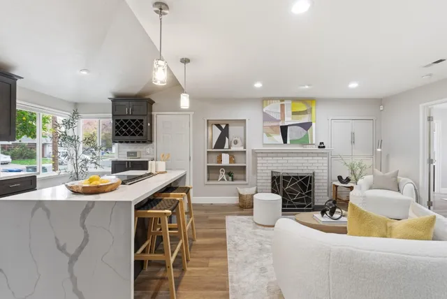 a bedroom with a bed and a couch