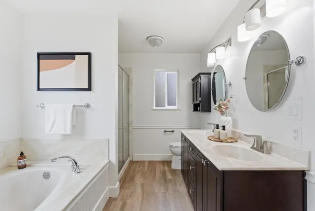 a backyard of a house with table and chairs