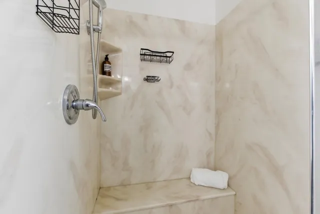 a backyard of a house with outdoor seating