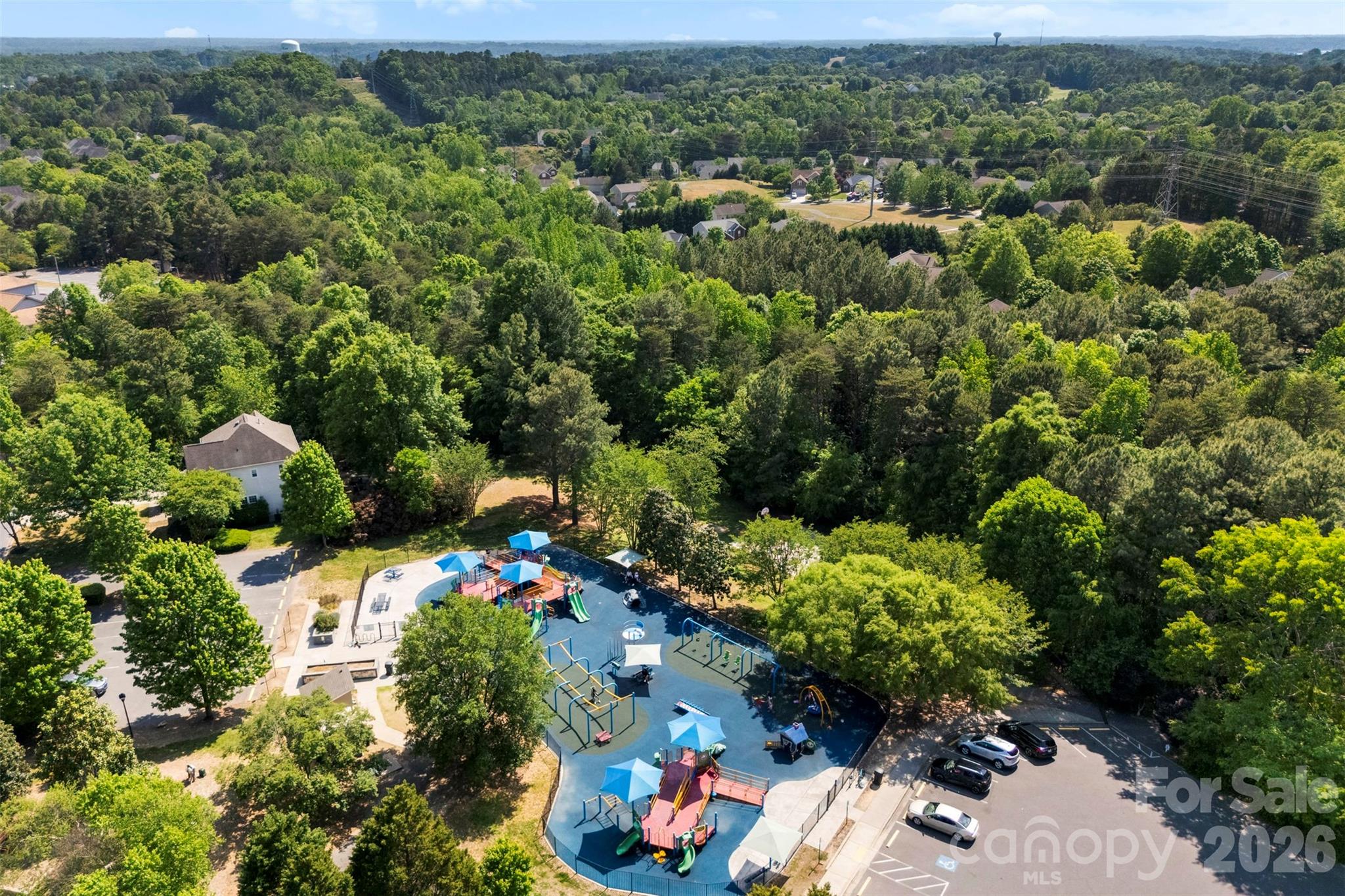 606 Andover Lane Tega Cay, SC 29708 - Photo 37 of 48 an aerial view of a house with a yard