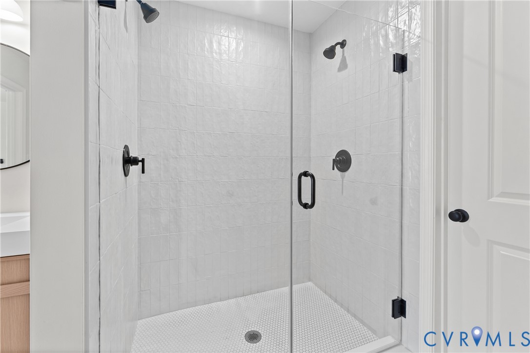 887 Campers Lane Ruther Glen, VA 22546 - Photo 21 of 42 a bathroom with a shower