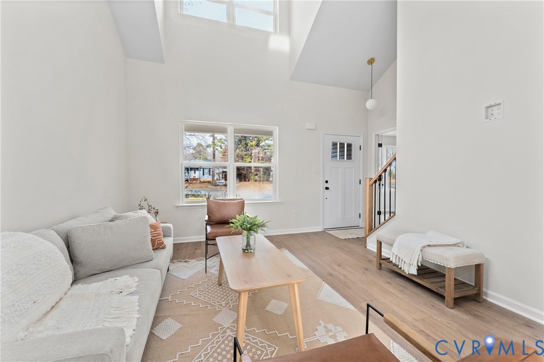 887 Campers Lane Ruther Glen, VA 22546 - Photo 3 of 42 a living room with furniture and a wooden floor
