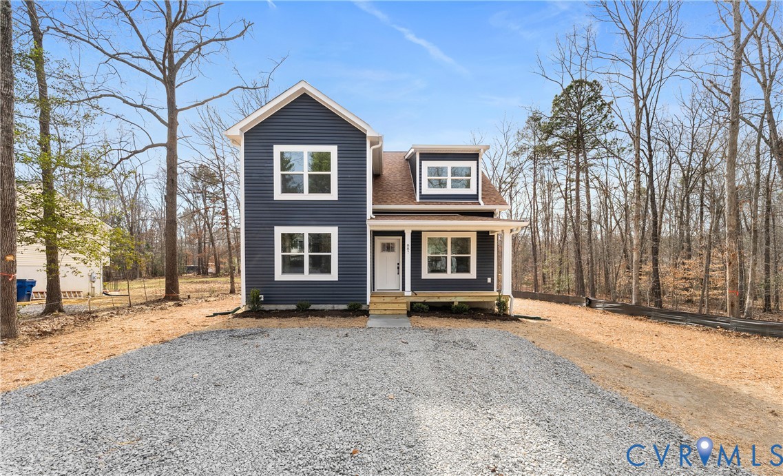887 Campers Lane Ruther Glen, VA 22546 - Photo 32 of 42 a view of front of a house with a yard