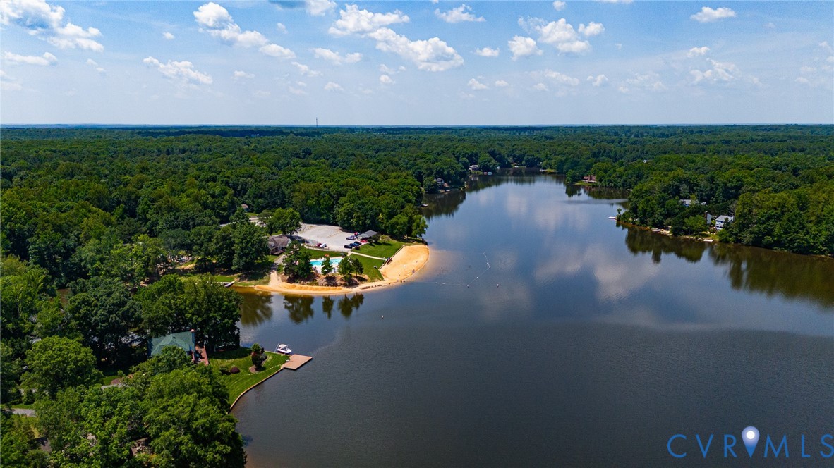 887 Campers Lane Ruther Glen, VA 22546 - Photo 42 of 42 an aerial view of a house with a garden and lake view