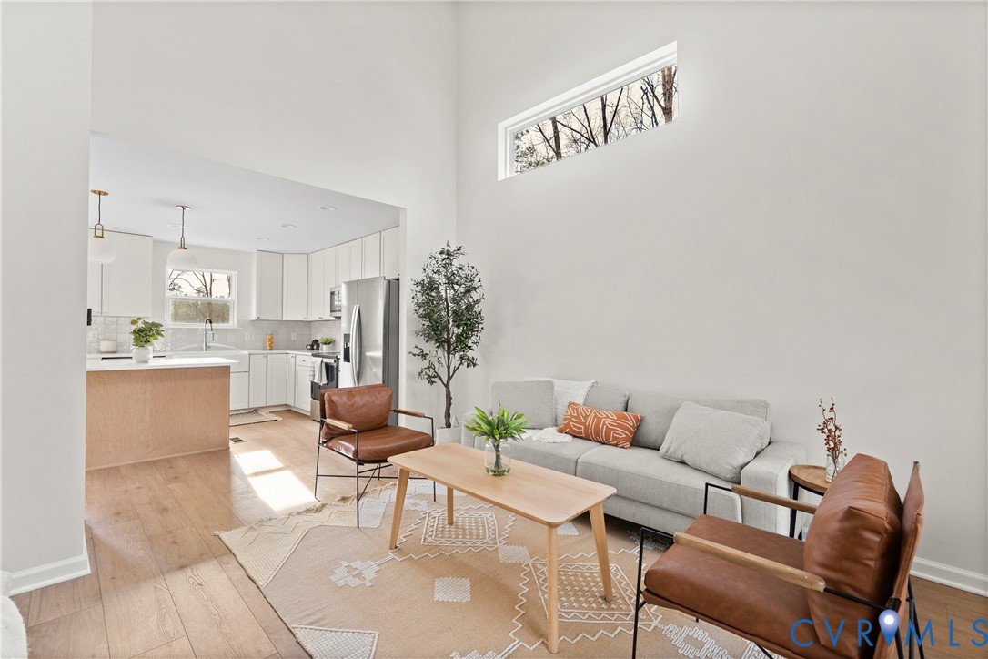 887 Campers Lane Ruther Glen, VA 22546 - Photo 5 of 42 a living room with furniture and a kitchen view