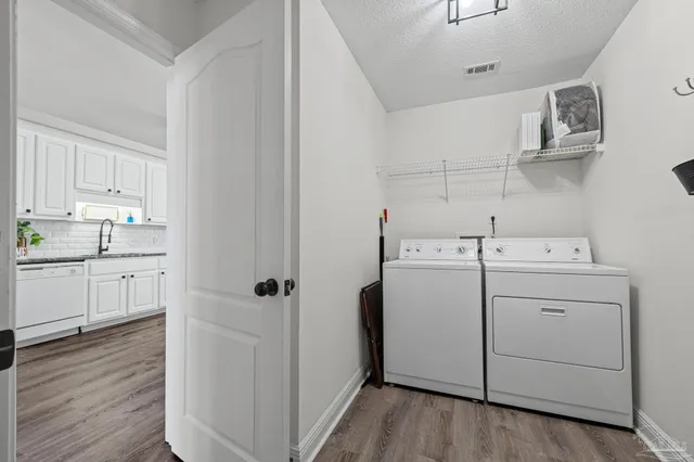 a bathroom with a bathtub a sink and a shower