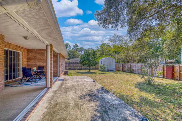 an aerial view of a house with a garden