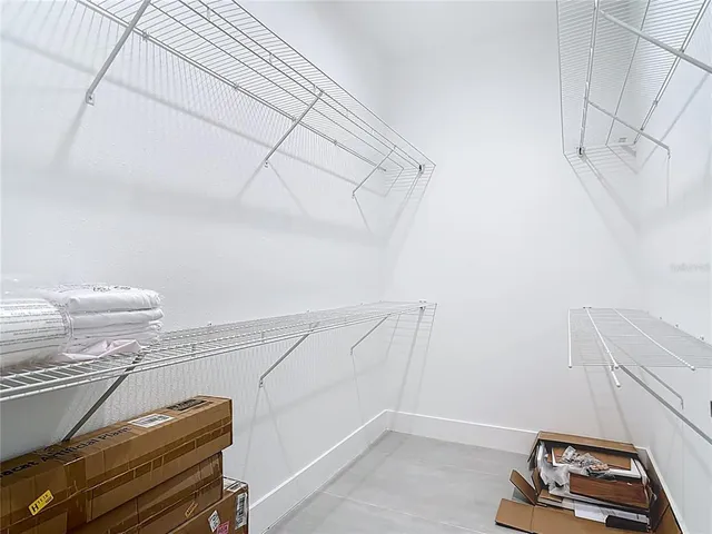 a view of a room with racks on the wall