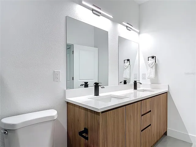 a bathroom with a sink and a toilet